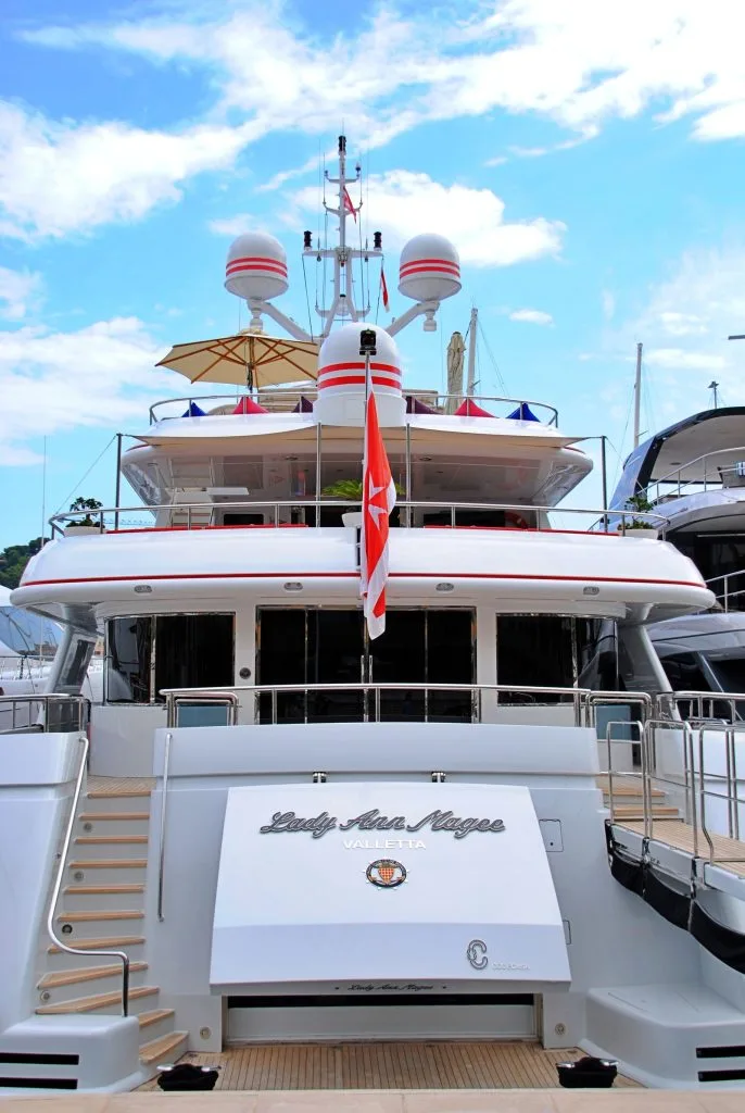 Superyacht berthed at a marina, cleaned and detailed to charter standard